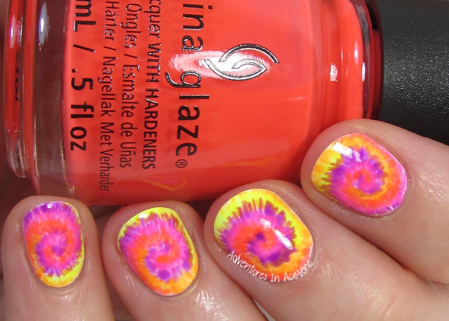 10. Tie-dye nail art for a psychedelic look - wide 5